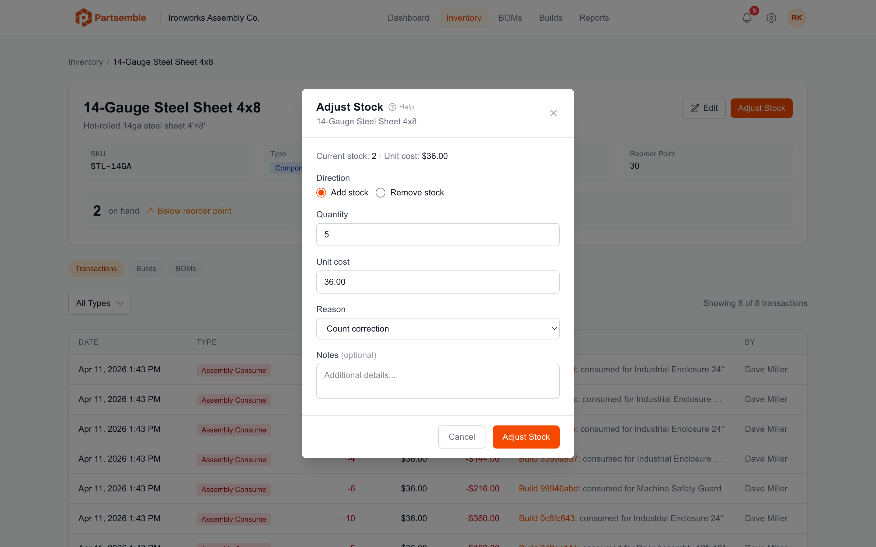 Stock adjustment dialog with direction, quantity, unit cost, and reason fields